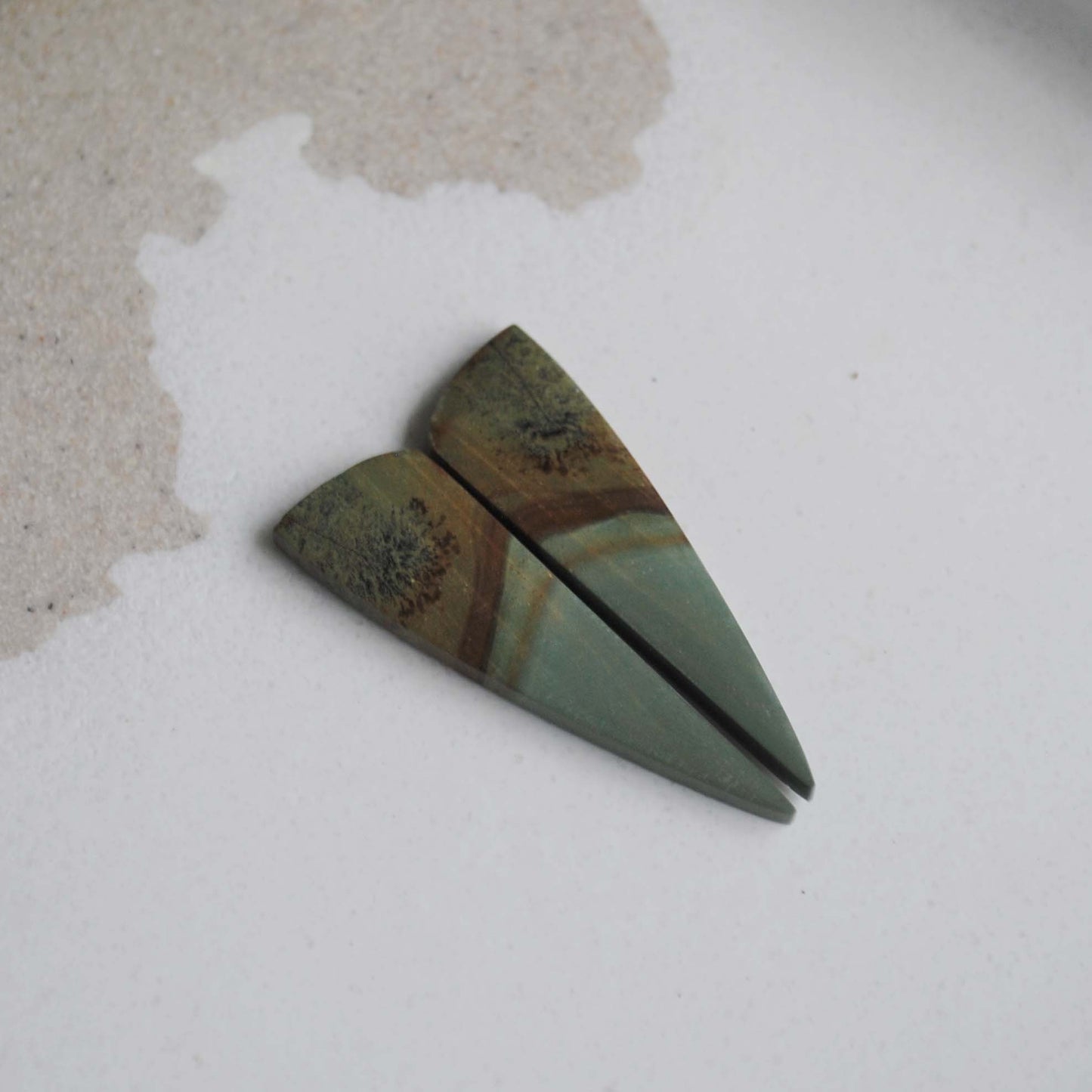 Jasper matched pair cabochons on light background