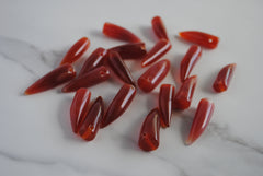 Carnelian pointed horn beads