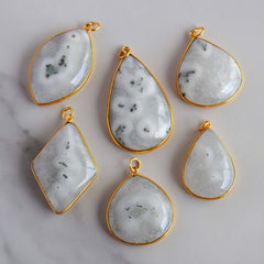 Solar Quartz gold plated pendants