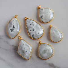 Solar Quartz gold plated pendants