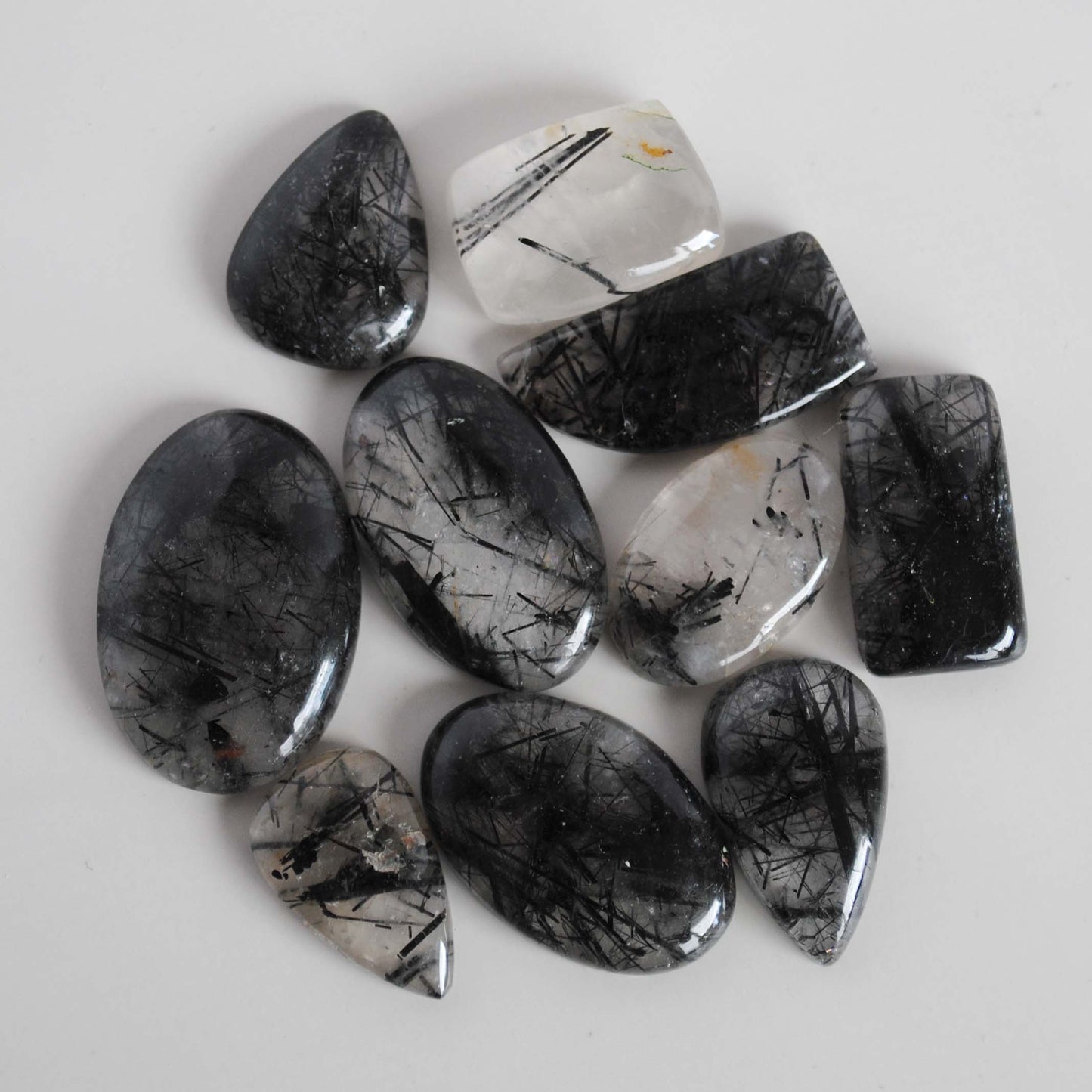 Tourmalinated quartz cabochons (Lot A)