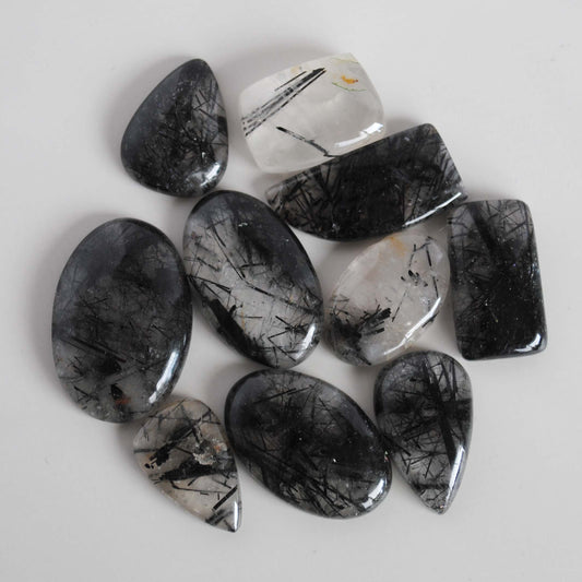 Tourmalinated quartz cabochons (Lot A)