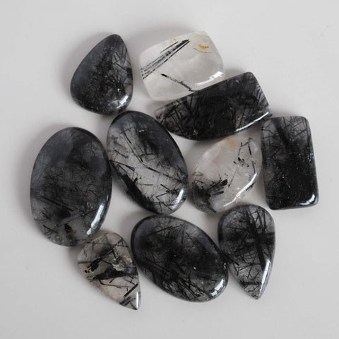Tourmalinated quartz cabochons (Lot A)