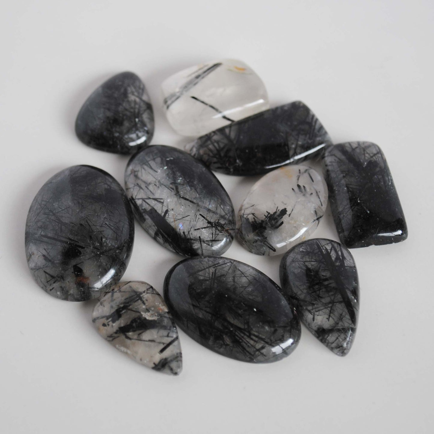 Tourmalinated quartz cabochons (Lot A)