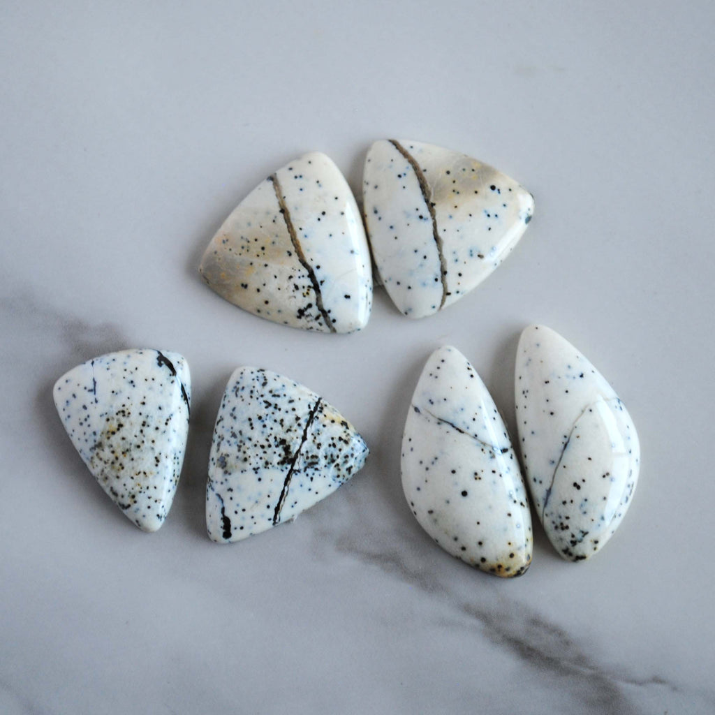 Dalmatian opal cabochons