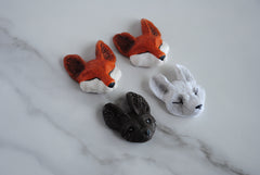 Polymer clay animal heads