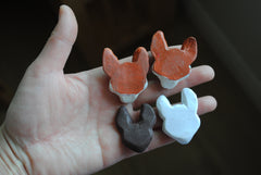 Polymer clay animal heads