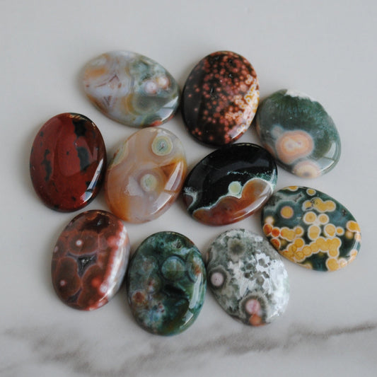 Colorful stones on a marble surface