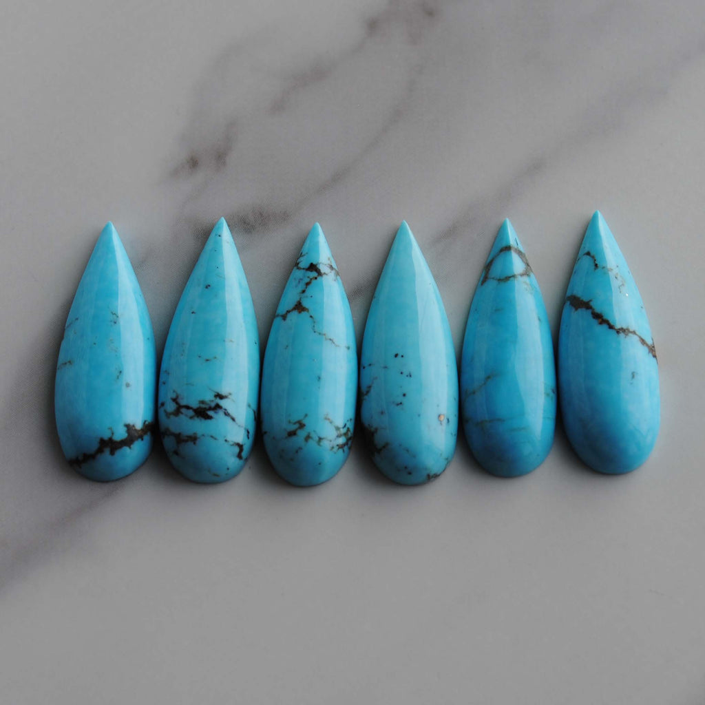 Kingman turquoise long drop/pear cabochons