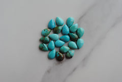 Kingman turquoise cabochons 7x10mm drops/pears (lot aa)