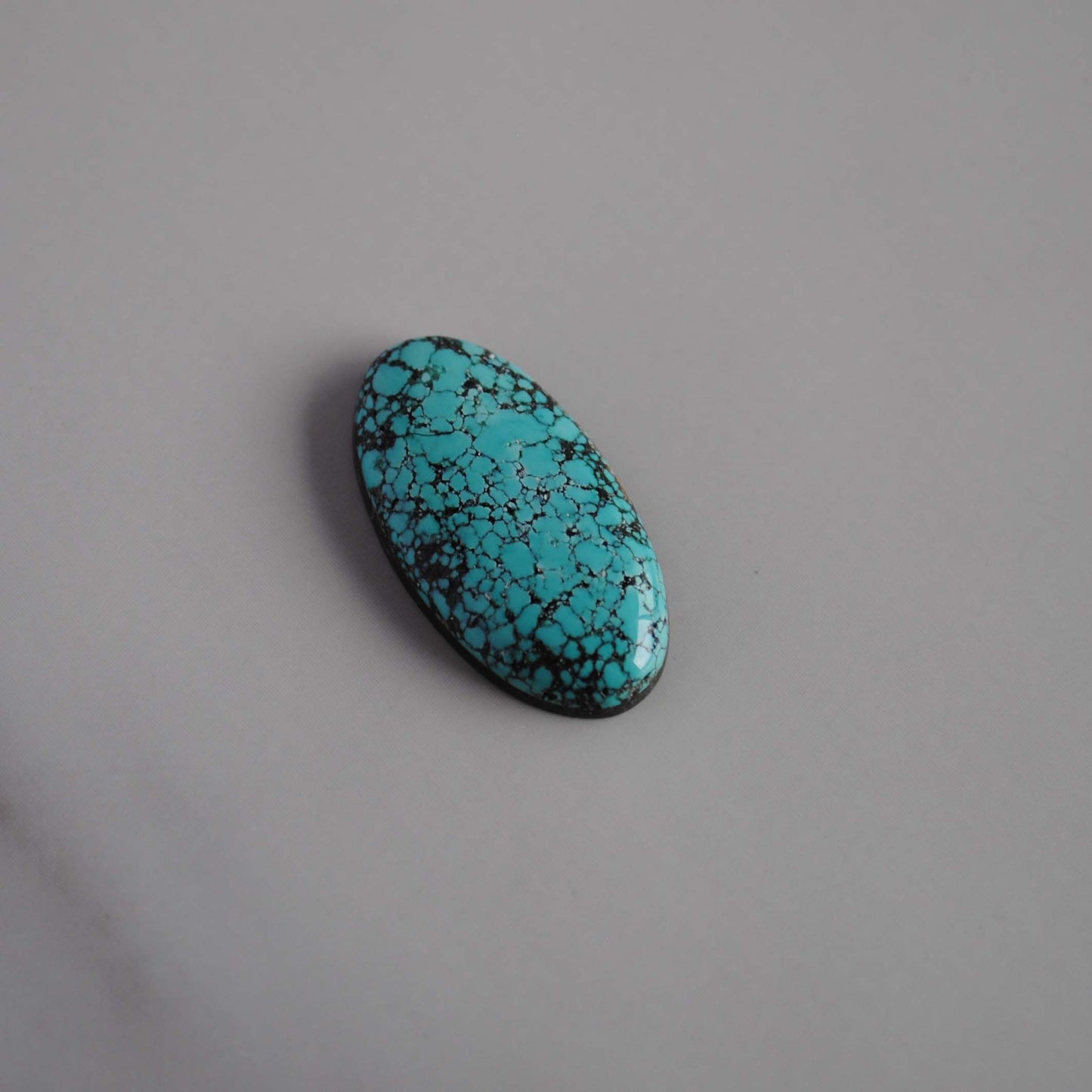 Number 8 turquoise cabochon