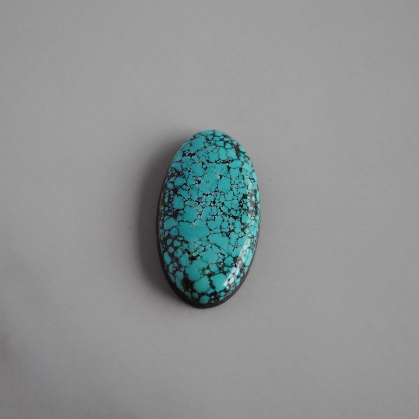 Number 8 turquoise cabochon