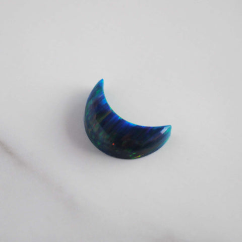 Aura opal crescent cabochon