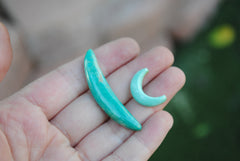Crescent turquoise cabochons