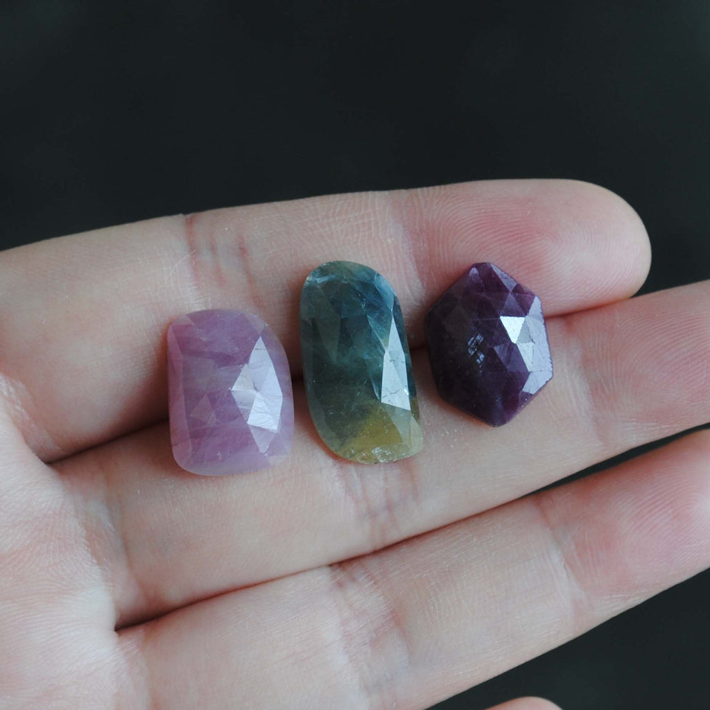 Faceted sapphire and ruby cabochons