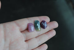 Faceted sapphire and ruby cabochons