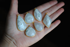 Solar Quartz gold plated pendants