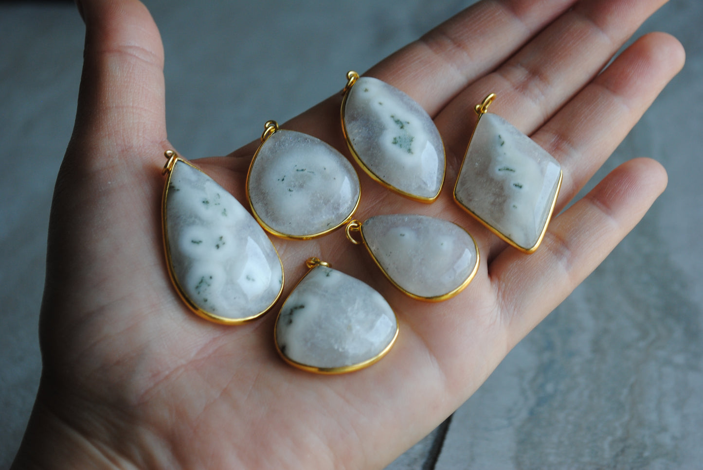 Solar Quartz gold plated pendants