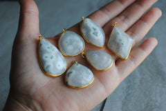 Solar Quartz gold plated pendants