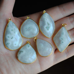 Solar Quartz gold plated pendants
