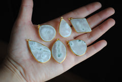 Solar Quartz gold plated pendants